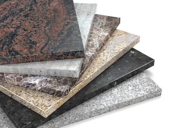 Palette of marble granite samples on white background.