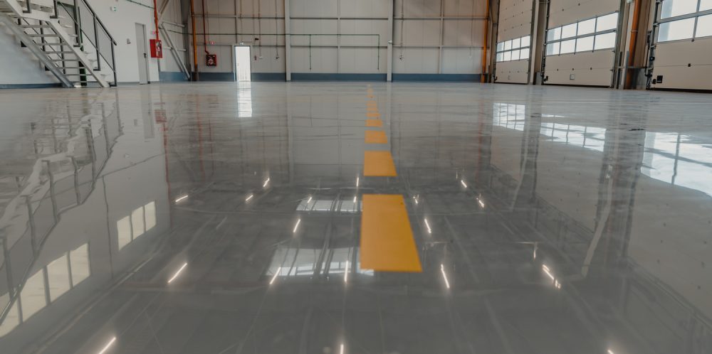 Epoxy,And,Waxed,Flooring,With,Colorful,Signage,In,Car,Service